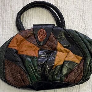 Vintage ‘crazy patchwork’ leather purse with top handles.